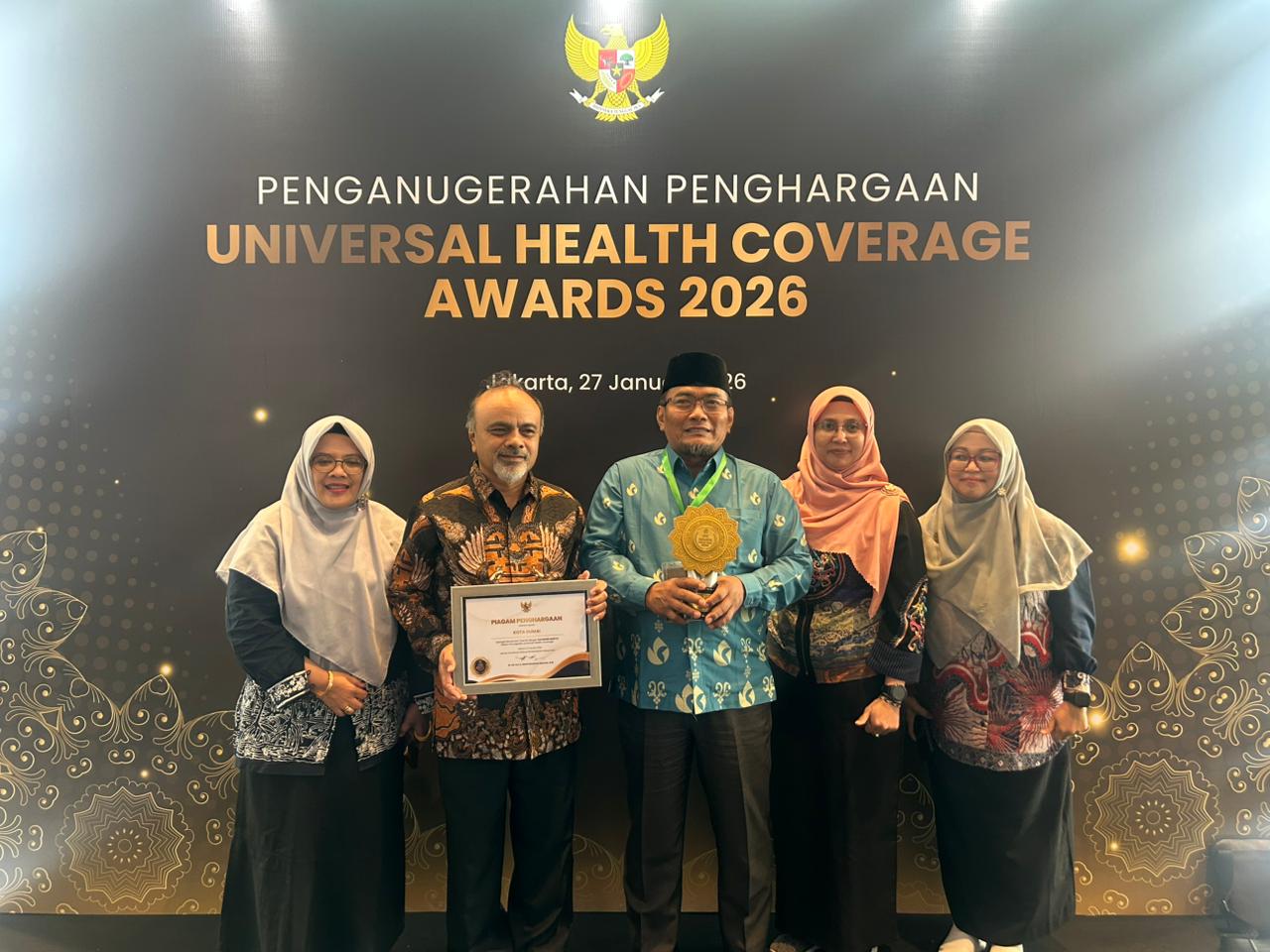Sinergi Pemko Dumai dan BPJS Kesehatan Berbuah Manis, Wawako Sugiyarto Terima UHC Award 2026 Kategori Madya