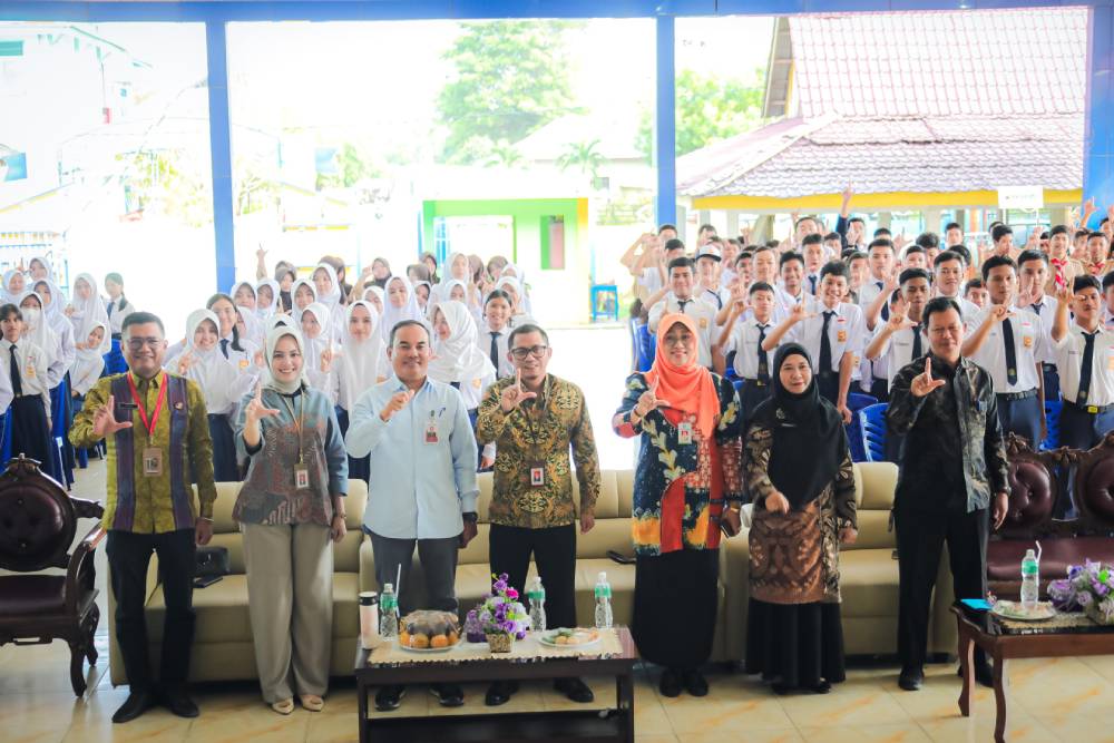 Tanamkan Budaya Menabung, Pemko Dumai dan OJK Riau Edukasi Ratusan Pelajar SMPN 2 Dumai